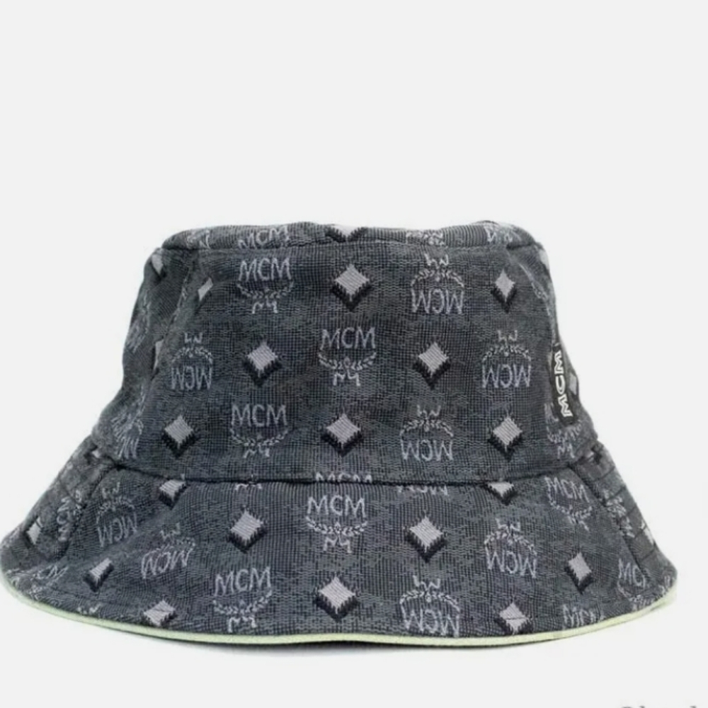 MCM visestos Bucket Hat Grey outside with green piping + inner lining.